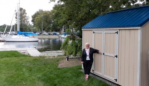 Wooden storage shed by the water